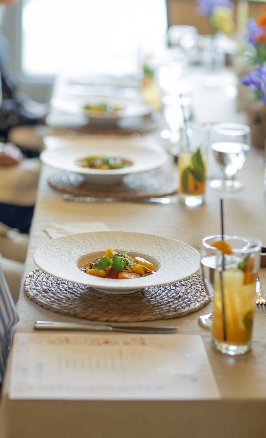 Artfully plated plant-based food at an intimate dining table